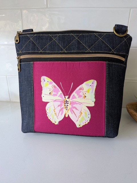 Butterfly denim crossbody bag handmade by Salty Bee Threads