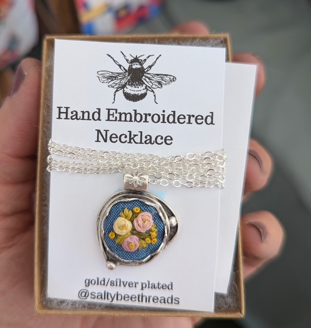 Embroidered flower necklace handmade by Salty Bee Threads