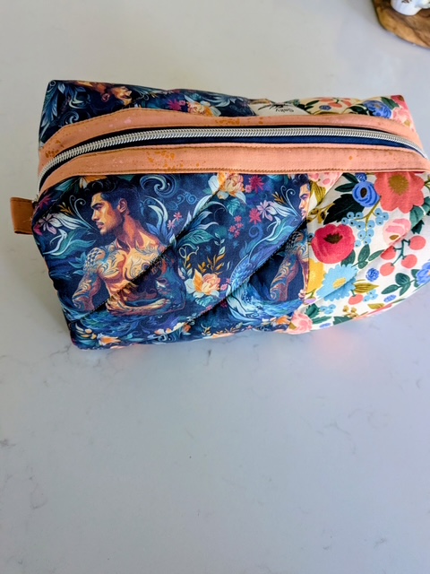 Blue puffy zipper pouch handmade by Salty Bee Threads