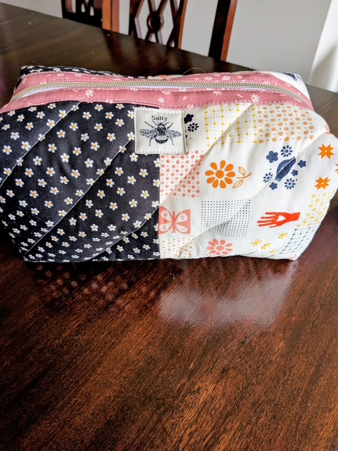 Quilted pink puffy zipper pouch handmade by Salty Bee Threads